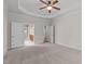 Main bedroom features trey ceiling with adjoining bath and closet at 208 Beckingham Loop, Cary, NC 27519