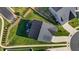 Bird's-eye view of a home, showcasing the roof, driveway, lawn, and landscaping at 2096 Dowell Ct, Burlington, NC 27215