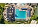 From above, the community pool looks inviting with plenty of seating, shade, and space for residents to relax and unwind at 2096 Dowell Ct, Burlington, NC 27215