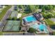 This aerial shot highlights the extensive recreation area amenities, including a pool, tennis, basketball, and volleyball courts at 2096 Dowell Ct, Burlington, NC 27215