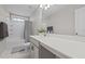 Bright bathroom with a vanity, a sink, and a shower at 2096 Dowell Ct, Burlington, NC 27215