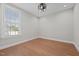 Bedroom features include hardwood floors, a window with blinds, and neutral walls at 2096 Dowell Ct, Burlington, NC 27215