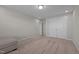 This bedroom is freshly painted, has neutral carpet, and white closets at 2096 Dowell Ct, Burlington, NC 27215