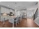 Open kitchen with white cabinets, granite countertops, stainless steel appliances, and large center island at 2096 Dowell Ct, Burlington, NC 27215