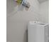This is a well-lit laundry room with shelving for storage and a modern washer and dryer at 2096 Dowell Ct, Burlington, NC 27215