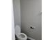 Compact bathroom with a toilet and basic fixtures at 2121 Lime St, Durham, NC 27704