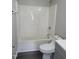 Clean bathroom with white shower tub and gray vanity at 2121 Lime St, Durham, NC 27704
