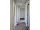 Hallway with carpet and doors leading to other rooms at 2121 Lime St, Durham, NC 27704