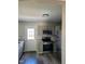 Modern kitchen featuring stainless steel appliances and granite countertops at 2121 Lime St, Durham, NC 27704