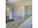 Bright kitchen featuring granite counters and a pantry for ample storage at 2121 Lime St, Durham, NC 27704