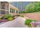 Beautifully landscaped backyard with stone pathway leading to the house at 216 Colonial Ridge Dr, Pittsboro, NC 27312