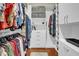 Organized walk-in closet with custom shelving and storage solutions, maximizing space and convenience at 216 Colonial Ridge Dr, Pittsboro, NC 27312