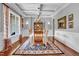 Elegant dining room featuring detailed ceilings, hardwood floors, and natural light at 216 Colonial Ridge Dr, Pittsboro, NC 27312