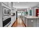 Spacious kitchen with stainless steel appliances, granite countertops and modern cabinetry at 216 Colonial Ridge Dr, Pittsboro, NC 27312