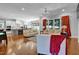 Bright open living space with modern finishes connecting the kitchen and Gathering area at 216 Colonial Ridge Dr, Pittsboro, NC 27312
