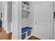 Functional mud room with built-in storage, a bench, and easy access to the entryway at 216 Colonial Ridge Dr, Pittsboro, NC 27312