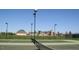 Tennis courts in a community setting with clear blue skies at 216 Colonial Ridge Dr, Pittsboro, NC 27312