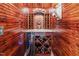 Custom wine cellar with wood finishes, dedicated wine cooler, and ample storage for the wine enthusiast at 216 Colonial Ridge Dr, Pittsboro, NC 27312