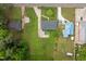 An aerial view showcases the property's proximity to the main road, surrounding greenery and other properties at 2315 Oxford Rd, Henderson, NC 27536