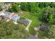 An aerial view highlights the property's proximity to the main road and surrounding greenery and homes at 2315 Oxford Rd, Henderson, NC 27536