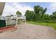The home features a spacious backyard and an elevated deck overlooking the grounds at 2315 Oxford Rd, Henderson, NC 27536