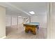 Finished basement with a pool table, vinyl flooring, and recessed lighting at 2315 Oxford Rd, Henderson, NC 27536