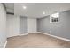 Spacious basement with vinyl flooring, fresh paint, storage, and ample closet space at 2315 Oxford Rd, Henderson, NC 27536