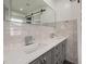 Sleek bathroom featuring a double vanity with marble countertops and modern faucets at 2315 Oxford Rd, Henderson, NC 27536