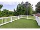Deck overlooking lush greenery, offering a serene outdoor space at 2315 Oxford Rd, Henderson, NC 27536