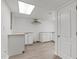 Spacious kitchen with granite countertops, white cabinets and a stainless steel exhaust fan at 2315 Oxford Rd, Henderson, NC 27536