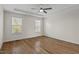 Bedroom with tray ceiling and natural light from two windows at 25 Mannford Ln, Angier, NC 27501