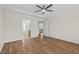Bedroom with hardwood floors and doorways leading to various rooms at 25 Mannford Ln, Angier, NC 27501