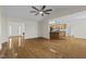 Open living space with hardwood floors, seamless flow to the kitchen and dining area at 25 Mannford Ln, Angier, NC 27501