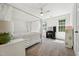 Bright bedroom with a canopy bed, vanity, and a light ceiling fan at 2709 Penfold Ln, Wake Forest, NC 27587