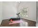 Bright exercise room with hardwood floors, natural light and vaulted ceiling at 2709 Penfold Ln, Wake Forest, NC 27587