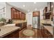 Well-appointed kitchen with stainless steel appliances and custom cabinetry providing style and functionality at 2709 Penfold Ln, Wake Forest, NC 27587