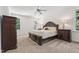 Main bedroom with natural light, a ceiling fan, and a neutral color palette at 2709 Penfold Ln, Wake Forest, NC 27587