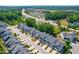 Aerial view of townhomes showcasing meticulously maintained landscaping and convenient parking at 2727 Masonboro Ferry Dr, Apex, NC 27502