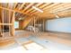 Unfinished basement with exposed wood framing, ductwork, and a small window at 2727 Masonboro Ferry Dr, Apex, NC 27502