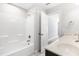 Bathroom with a shower/bathtub combo, double vanity and open doorway at 2727 Masonboro Ferry Dr, Apex, NC 27502