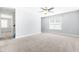 Bedroom with neutral carpet, light-gray walls, and window with white trim at 2727 Masonboro Ferry Dr, Apex, NC 27502