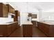 Modern kitchen featuring stainless steel appliances, an island, and abundant cabinet space at 2727 Masonboro Ferry Dr, Apex, NC 27502