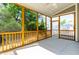 Bright screened porch with ceiling fan offering a relaxing outdoor space at 2727 Masonboro Ferry Dr, Apex, NC 27502