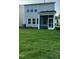Spacious backyard with a screened-in porch, perfect for outdoor entertaining and relaxation at 3112 Star Gazing Ln, Durham, NC 27703