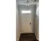 Clean, inviting entryway with wood-look floors and a stylish overhead light fixture at 3112 Star Gazing Ln, Durham, NC 27703