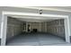 Spacious two-car garage with concrete floor at 3112 Star Gazing Ln, Durham, NC 27703