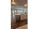 Modern kitchen with a center island and stainless steel dishwasher at 3112 Star Gazing Ln, Durham, NC 27703