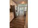 Bright kitchen with stainless steel appliances and a view of the living space at 3112 Star Gazing Ln, Durham, NC 27703