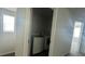 Convenient laundry room features a washer, dryer, and ample storage space with shelving at 3112 Star Gazing Ln, Durham, NC 27703
