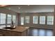 Bright, open-concept living area with hardwood floors and an abundance of natural light at 3112 Star Gazing Ln, Durham, NC 27703